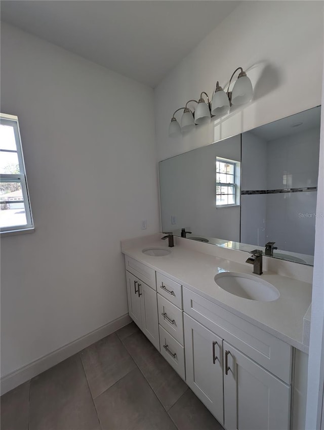 bathroom with vanity and tile patterned floors