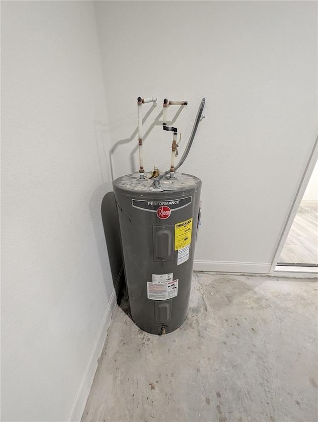 utility room with water heater