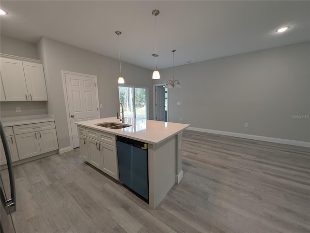 kitchen with sink, white cabinetry, hanging light fixtures, a center island with sink, and stainless steel dishwasher