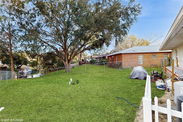 view of yard with a water view