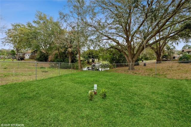 view of yard featuring fence