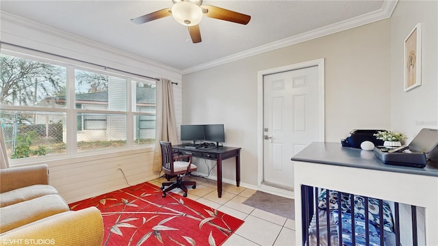 office featuring light tile patterned floors, baseboards, ornamental molding, and a ceiling fan