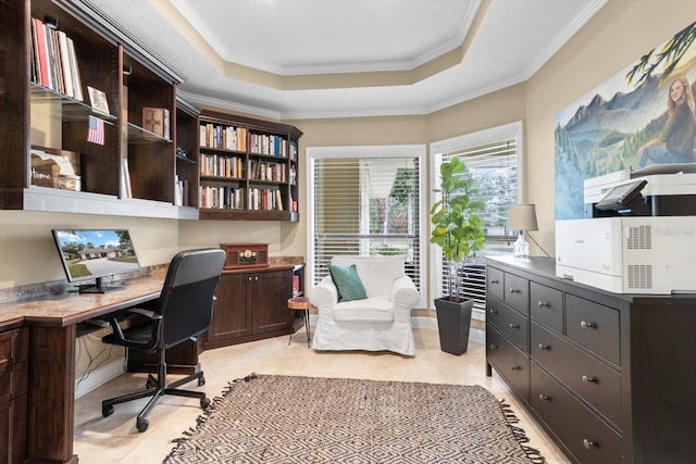 tiled office featuring ornamental molding, a tray ceiling, and built in desk