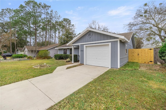 ranch-style home with a garage and a front yard