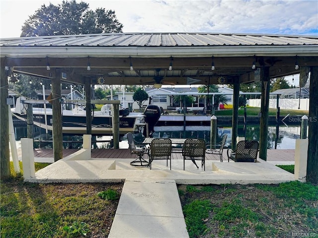 dock area featuring a water view and boat lift