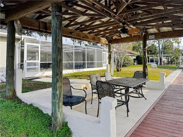 view of patio / terrace with outdoor dining space, a lanai, ceiling fan, and a gazebo