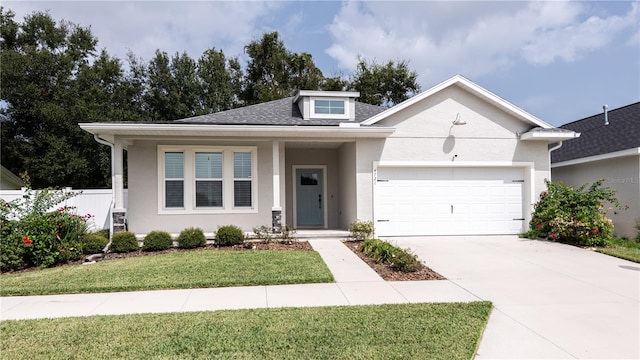 view of front of home with stucco siding, a shingled roof, an attached garage, driveway, and a front lawn