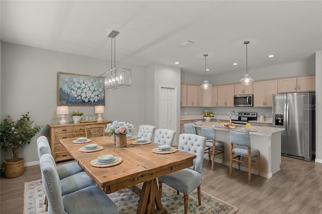 dining area featuring hardwood / wood-style floors