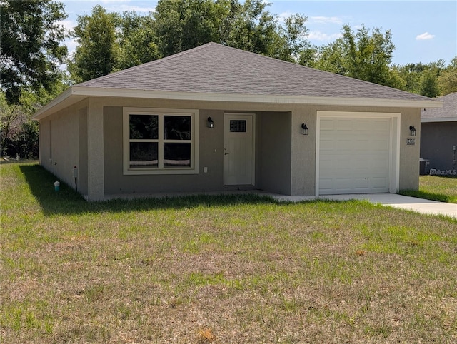 14259 SE 33rd Ter, Summerfield, FL 34491 - ranch-style house with stucco siding, an attached garage, and a front lawn