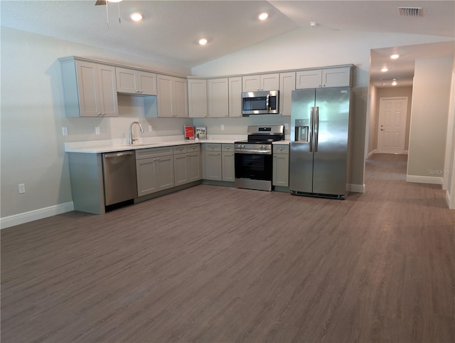 14259 SE 33rd Ter, Summerfield, FL 34491 - kitchen with stainless steel appliances, visible vents, gray cabinets, a sink, and baseboards