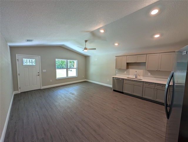 14259 SE 33rd Ter, Summerfield, FL 34491 - kitchen with dishwasher, gray cabinets, a sink, refrigerator, and dark wood-style flooring