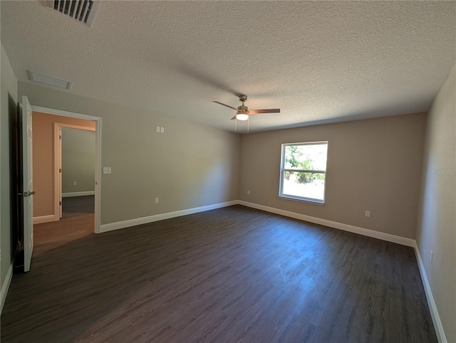 14259 SE 33rd Ter, Summerfield, FL 34491 - unfurnished room featuring dark wood-style floors, visible vents, a ceiling fan, baseboards, and a textured ceiling