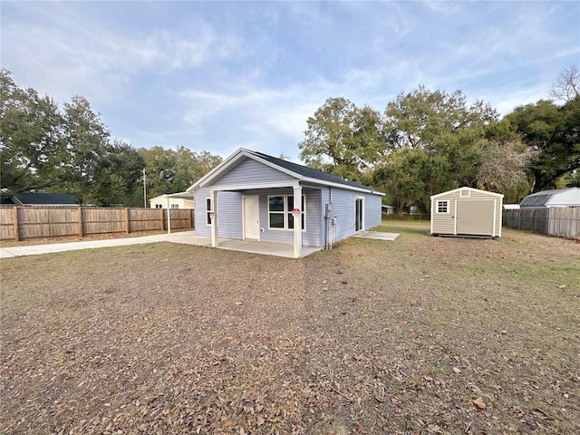 exterior space featuring a storage unit and a patio area