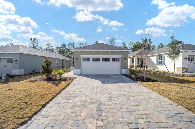 view of front of property with a garage