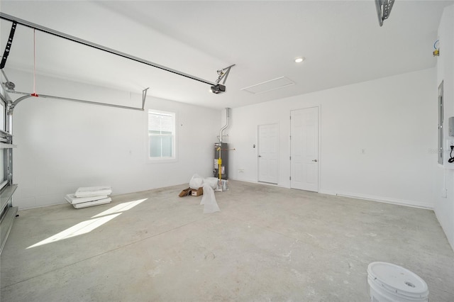 garage featuring a garage door opener and gas water heater