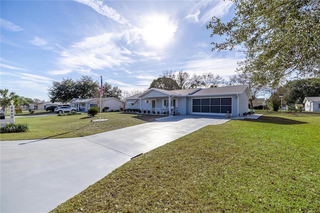 ranch-style house with a garage and a front lawn