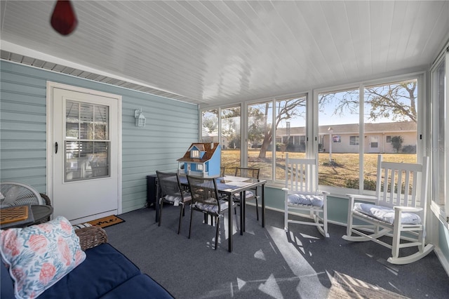 sunroom with wood ceiling