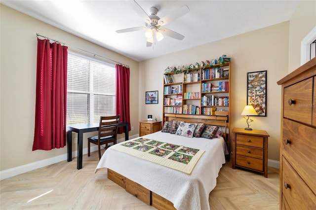 bedroom featuring light parquet floors and ceiling fan