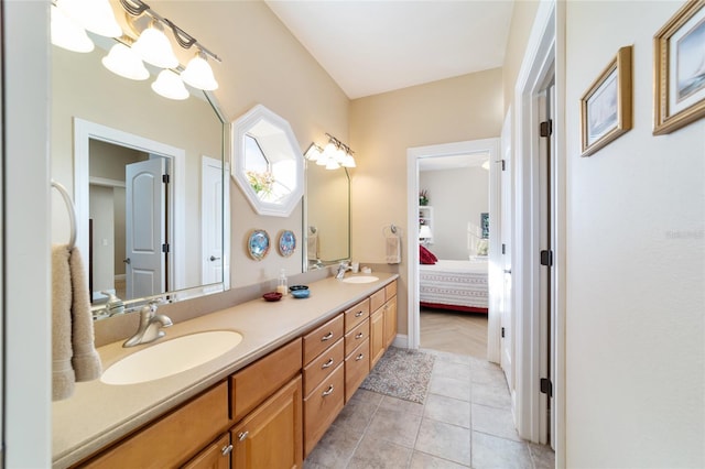 bathroom with vanity, tile patterned flooring, and a notable chandelier