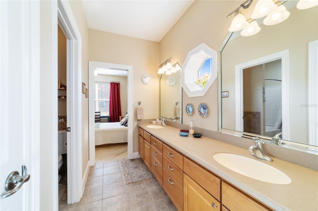 bathroom with vanity and tile patterned floors