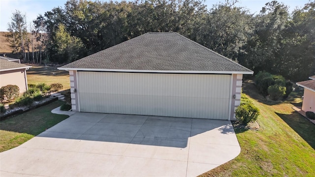 garage with a lawn