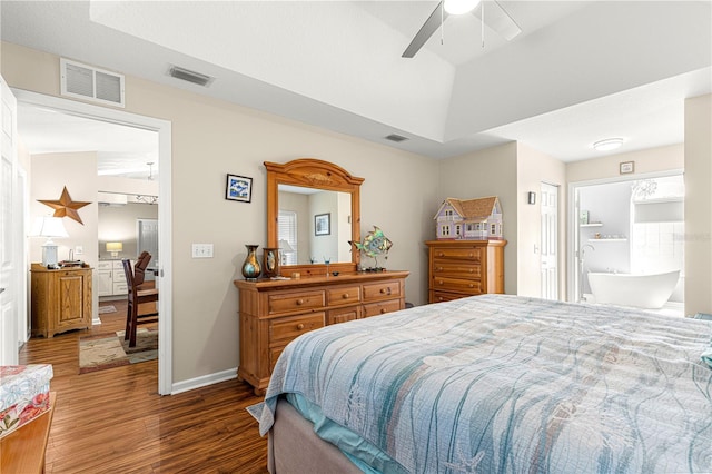 bedroom featuring ceiling fan, lofted ceiling, and hardwood / wood-style floors