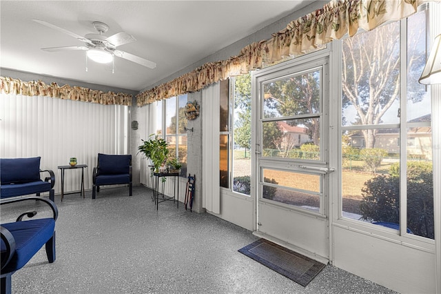 interior space featuring ceiling fan