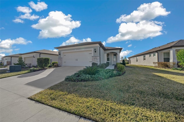 single story home featuring a garage and a front yard