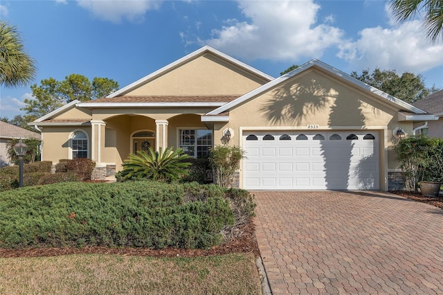 view of front of home with a garage