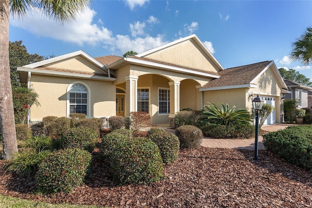 view of front of home featuring a garage