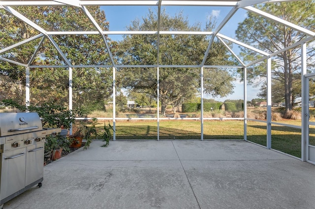 view of patio / terrace with a lanai