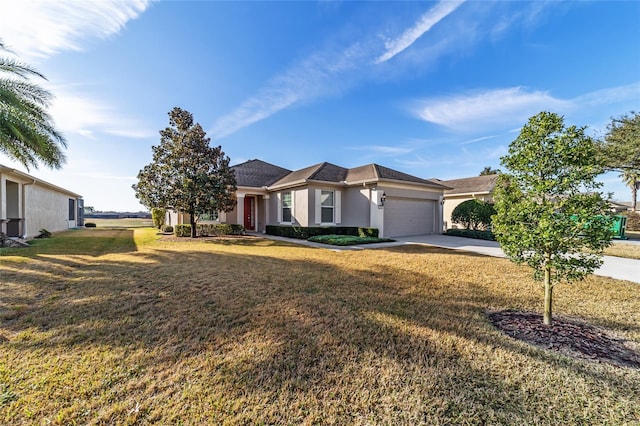 ranch-style home with a garage and a front lawn