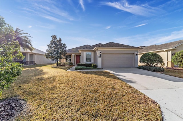 single story home featuring a garage and a front lawn