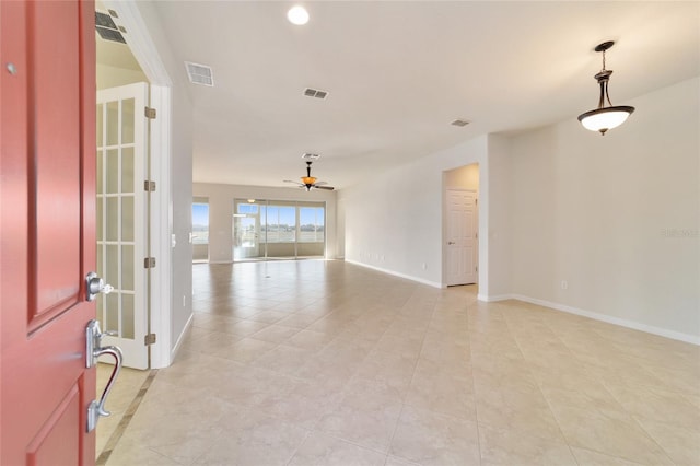 spare room featuring ceiling fan