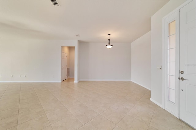 view of tiled spare room