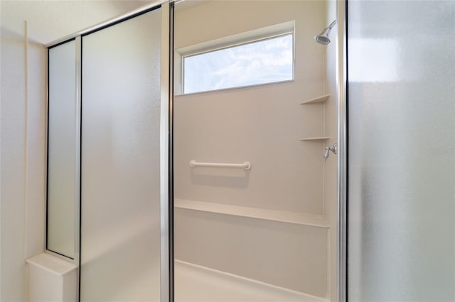 bathroom with an enclosed shower