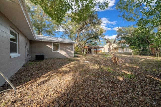 view of yard featuring central AC unit