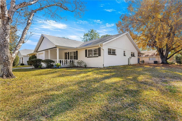 exterior space with a lawn and covered porch