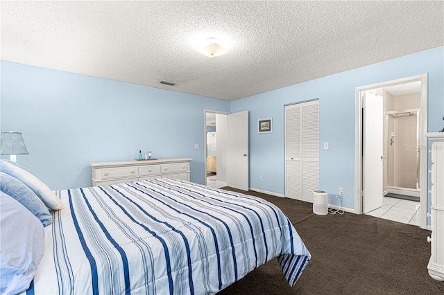 bedroom featuring light colored carpet, a closet, and a textured ceiling