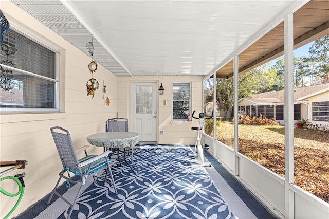 sunroom featuring plenty of natural light