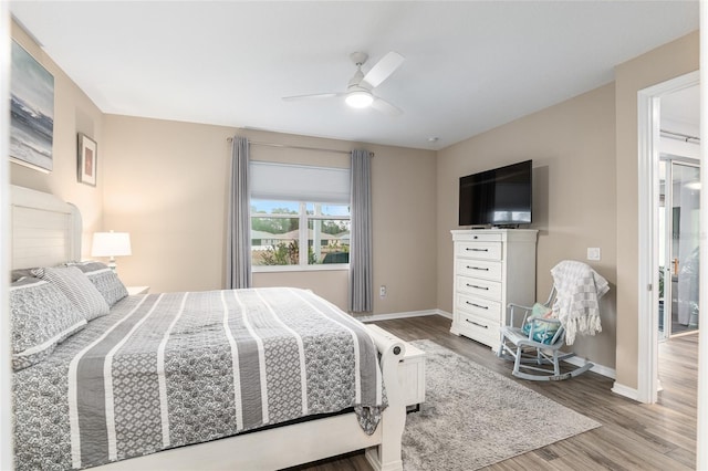 bedroom featuring wood-type flooring and ceiling fan