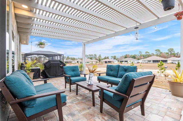 view of patio / terrace with a grill, an outdoor hangout area, and a pergola