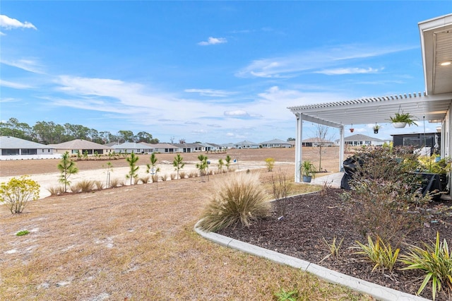 view of yard with a pergola