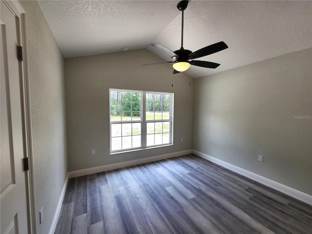 7799 SW 132nd Pl Unit 10, Ocala, FL 34473 - unfurnished room with a textured ceiling, dark wood-style flooring, a ceiling fan, a textured wall, and vaulted ceiling
