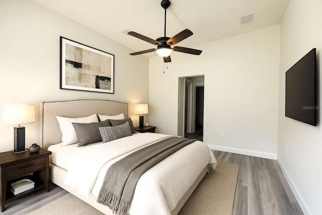7799 SW 132nd Pl Unit 10, Ocala, FL 34473 - bedroom with wood finished floors and a ceiling fan