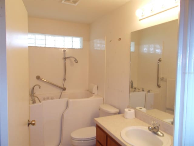 full bath featuring a bath, visible vents, toilet, and vanity