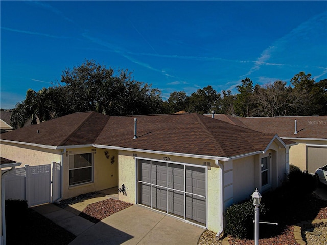 ranch-style home featuring a garage