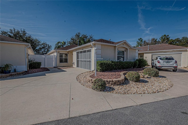 single story home featuring a garage