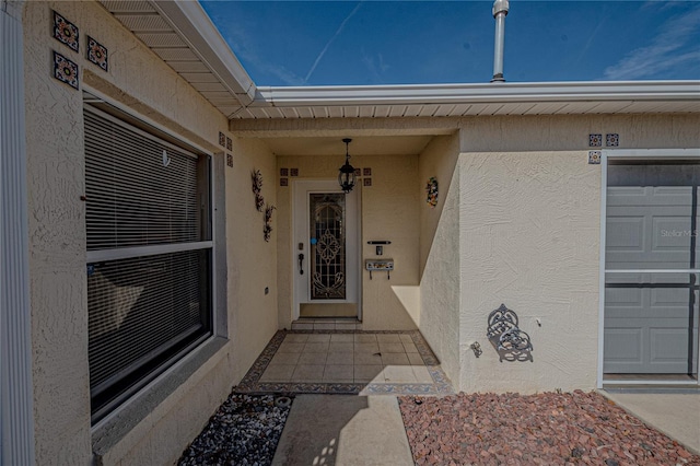 property entrance with a garage