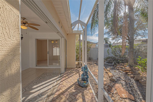 view of patio featuring ceiling fan